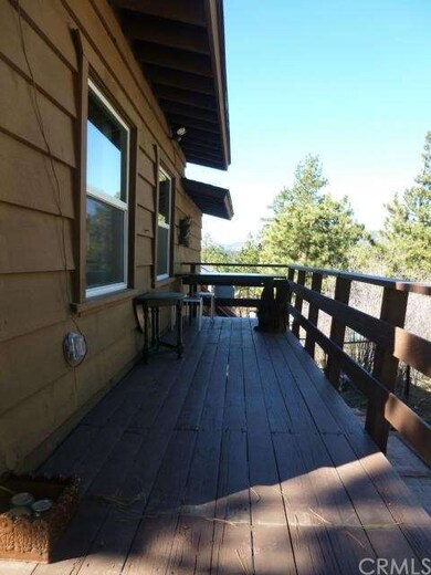 More decking to north of cabin, just repainted, su