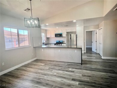 Kitchen featuring appliances with stainless steel