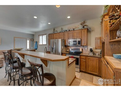 Granite Counters and Stainless in Both Kitchens