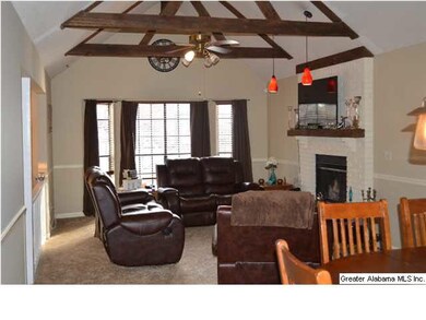 The openness of the living and dining rooms yield 