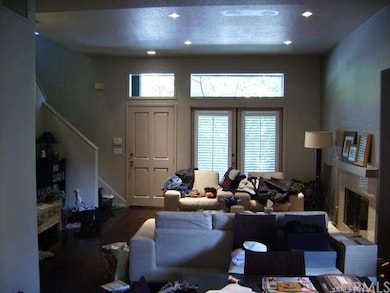 Open Layout Living Area With Plantation Shutter, F