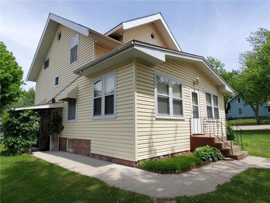 SW view of the home- with vinyl siding