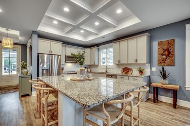 Kitchen featuring stainless steel appliances, hang