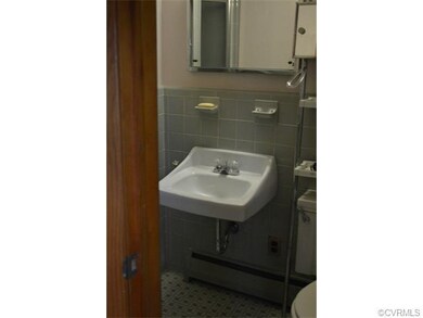 One of two vintage bathrooms.