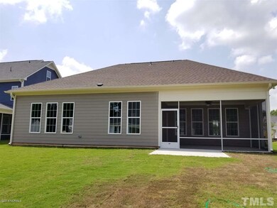 Back of house with screen porch