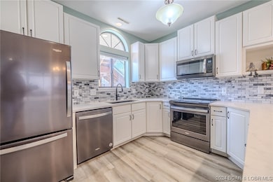 Bright kitchen with new countertops and stainless