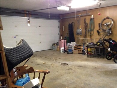 Large 2 car attached garage leads into family room.