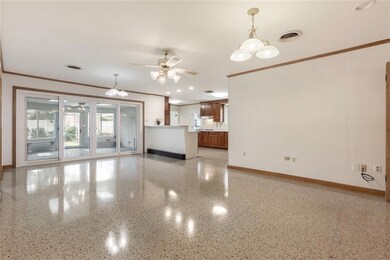 Oversized den with beautiful terrazzo floors that