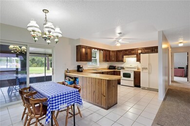 Main house dining area and kitchen off living area