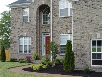 Walking up to the front porch.