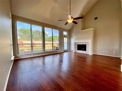 Living room with large windows creating lots of natural light.