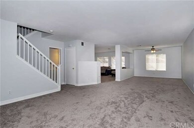 Very open area, with a powder half bath before the