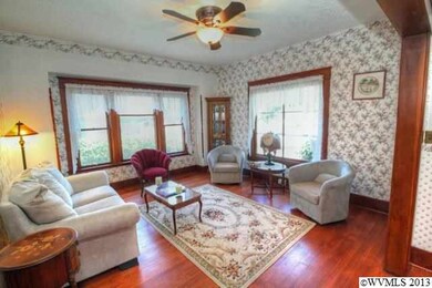 As you enter, the living room is on the right.