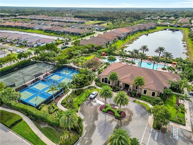 Drone / aerial view with a water view and a reside