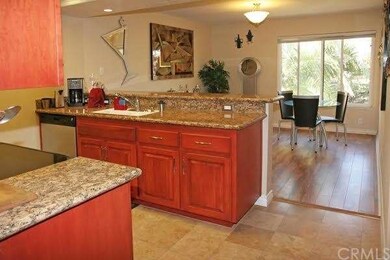 Cherry Wood Cabinets, Granite Countertops