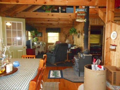 150' on S. Manistique lake with log cabi