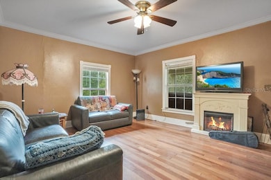 Step inside to discover ELEGANT TOUCHES like crown molding, soaring ceilings, and abundant natural light that fills the space with warmth.