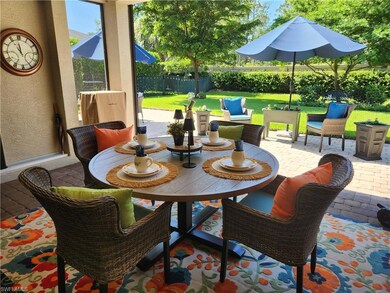 View of covered lanai with retractable screen pati