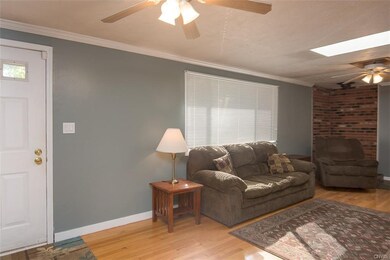 ENTRY OPENS TO LIVING ROOM