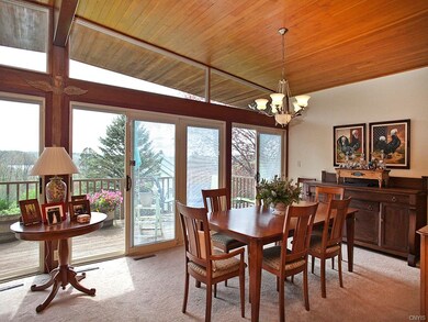 Your dining room opens to deck overlooking beautif