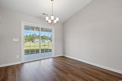 Unfurnished room featuring dark wood-style floorin