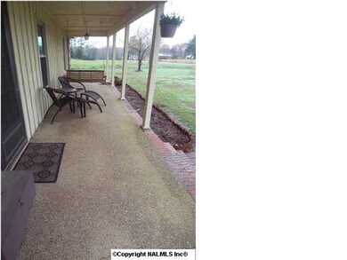 Covered Front Porch. Also has covered back porch.