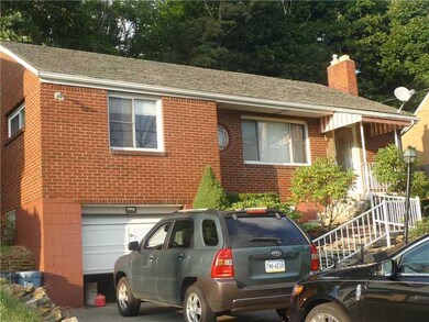 Exterior Front. One car integral garage and drivew