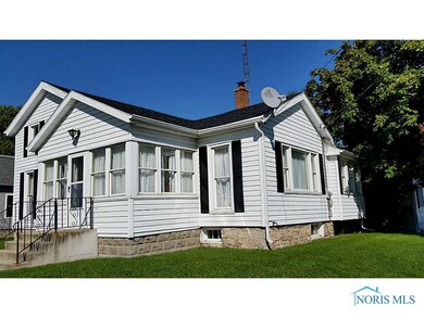 Exterior Front. Newer siding and windows.