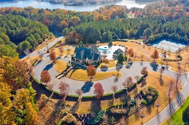 View of the clubhouse, pool, tennis courts, & play