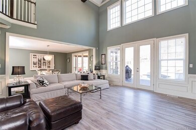 great room has view of pool and open floor
