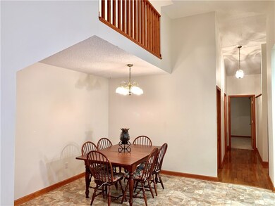 Dining room with balcony above