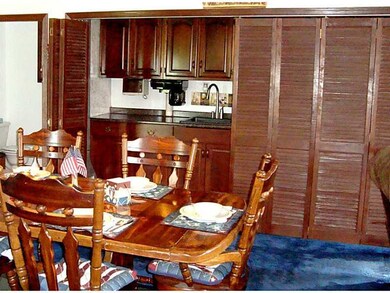 Great Room. Cherry cabinets & granite matching tha