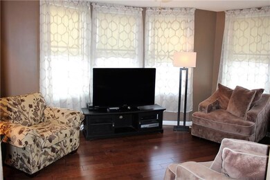 Living Room With Lots of Windows Providing Lots of