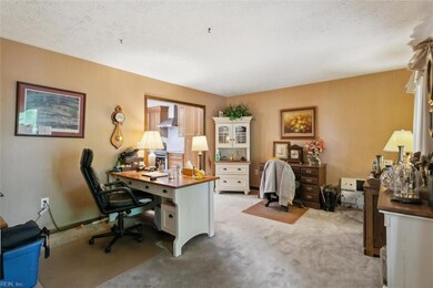 Living room currently used as an office.