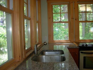 Kitchen with granite counters and...