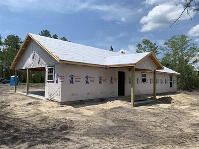right Rear home ..please note the porch.