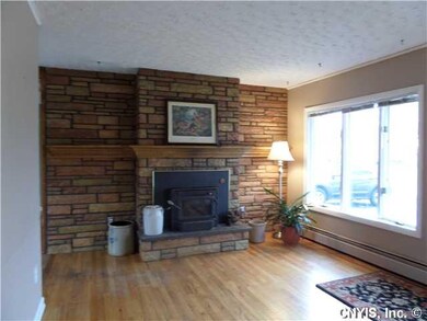 Living Room. LARGE PICTURE WINDOW IN LIVING ROOM F
