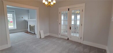 Formal DR with french doors to the sun porch