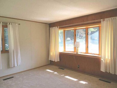 Living Room. The living room is sunny.