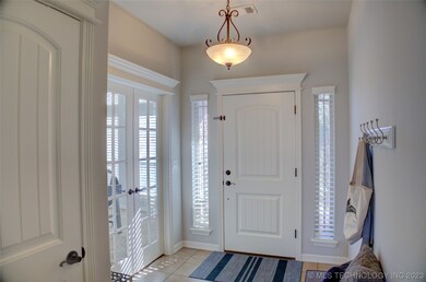 Large entry, office or 4th bedroom with french doo
