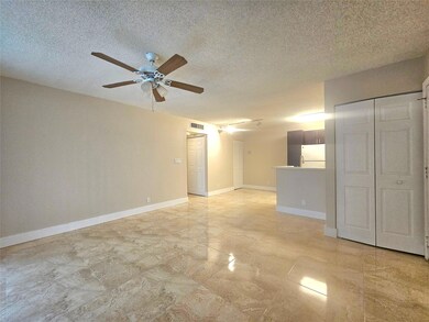 631 Lyons Rd unit 12105, Coconut Creek, FL 33063 - photo 2