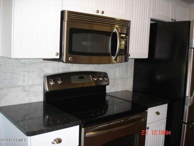 Stainless appliances and subway tile