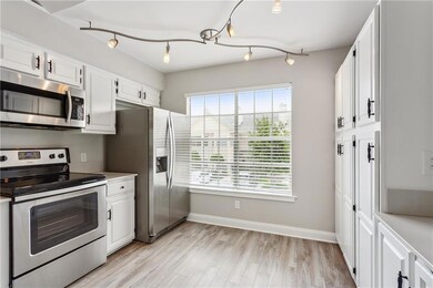 Kitchen Features Quartz Countertops