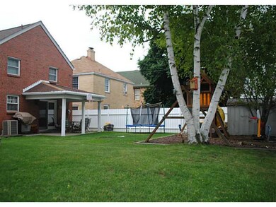 Exterior Back. LEVEL yard, 3/4 fenced in - vinyl p