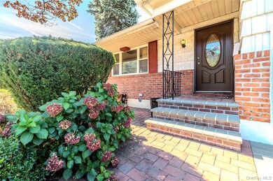 56-48 E Hampton Blvd, Flushing, NY 11364 - photo 2