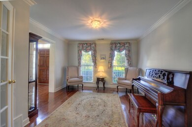 Currently used as a formal living room, this room 