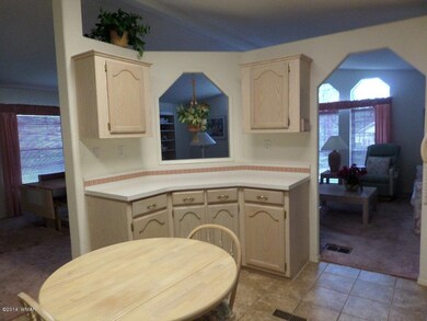 kitchen view to living & dining areas