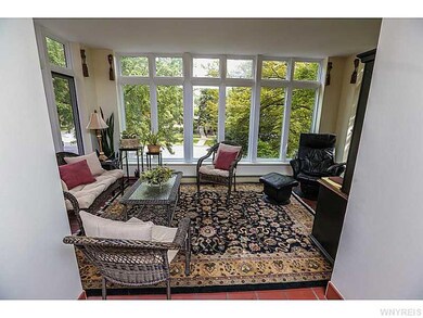 Den. Sunroom/ Den.  Currently used as office.
