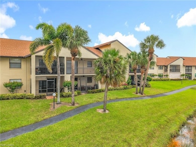 Surrounding community with a lawn and a balcony