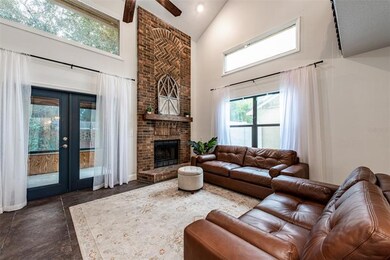Gather around the lovely brick front WOOD BURNING FIREPLACE with a wood mantel acting as the charming focal point of the home!